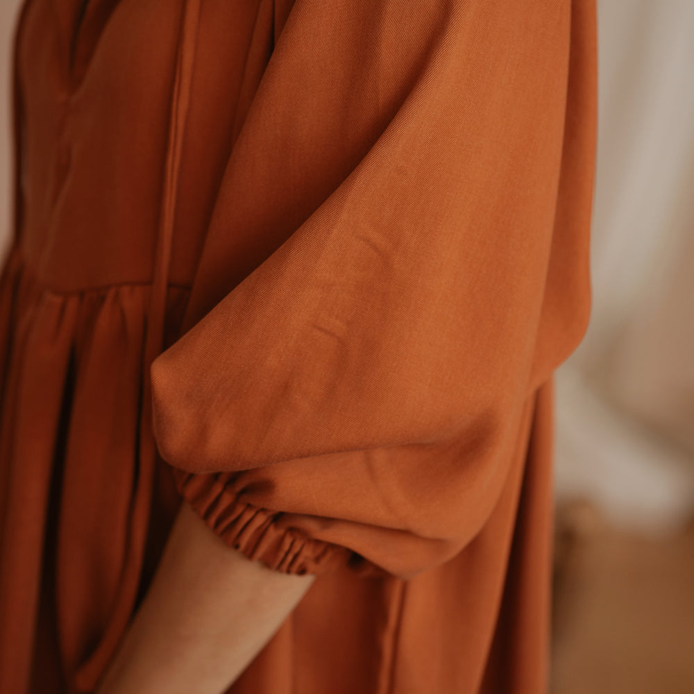 
                      
                        Malani dress / Burnt orange
                      
                    