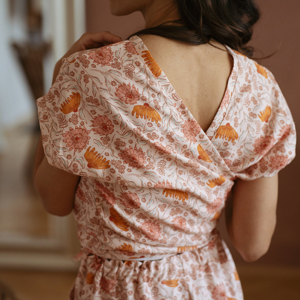 
                      
                        Mae wrap top / floral honey rose
                      
                    