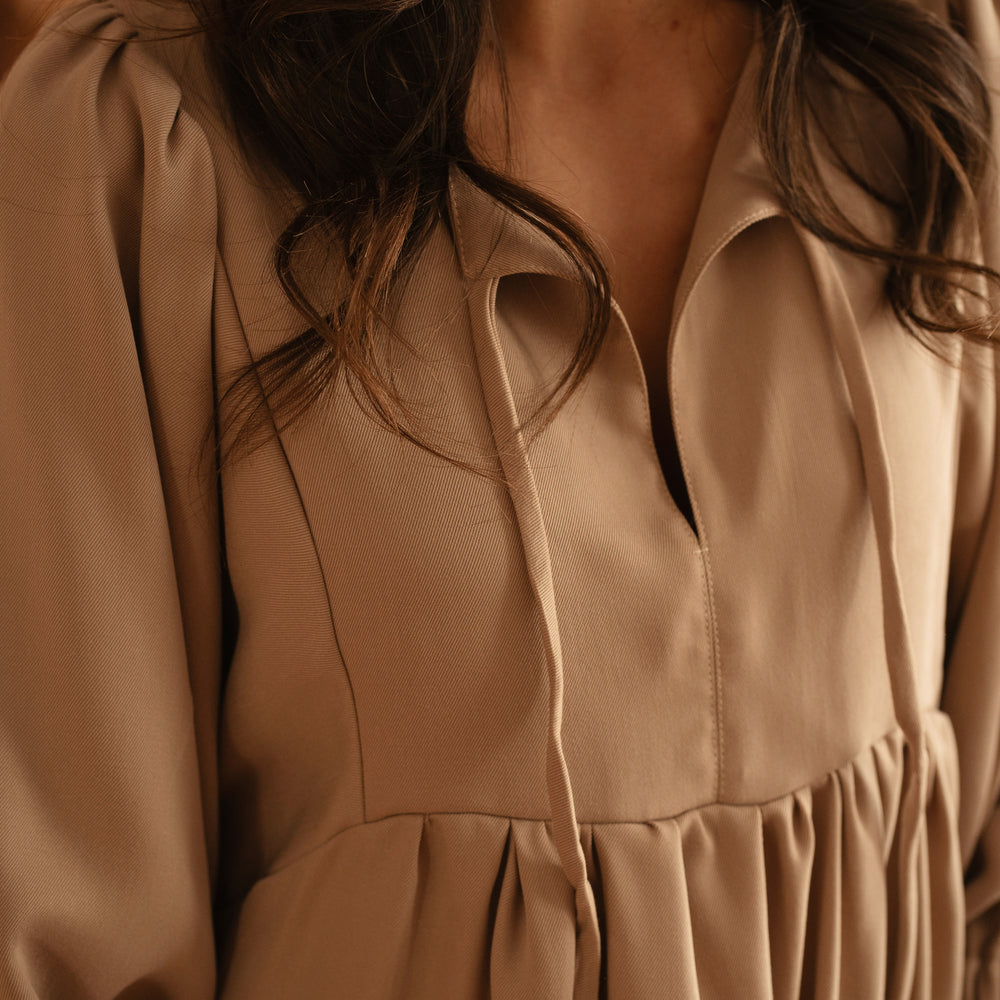 
                      
                        Malani dress / Beige
                      
                    