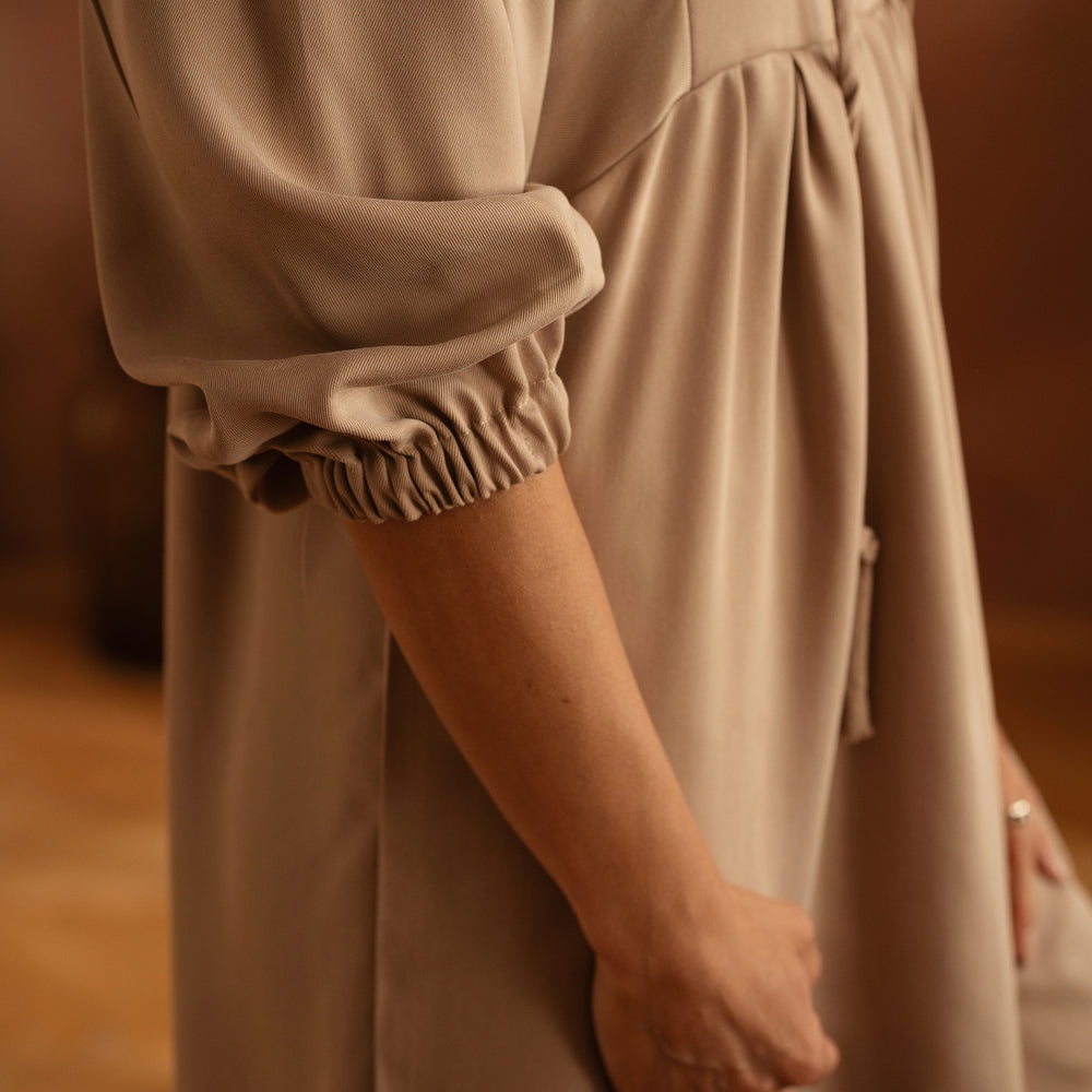 
                      
                        Malani dress / Beige
                      
                    