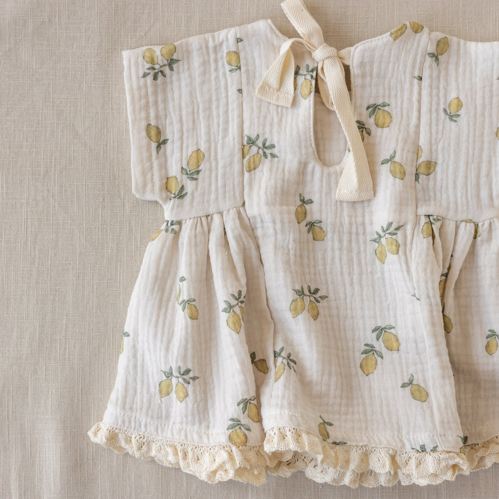 
                      
                        Malia baby dress / lemons + lace
                      
                    