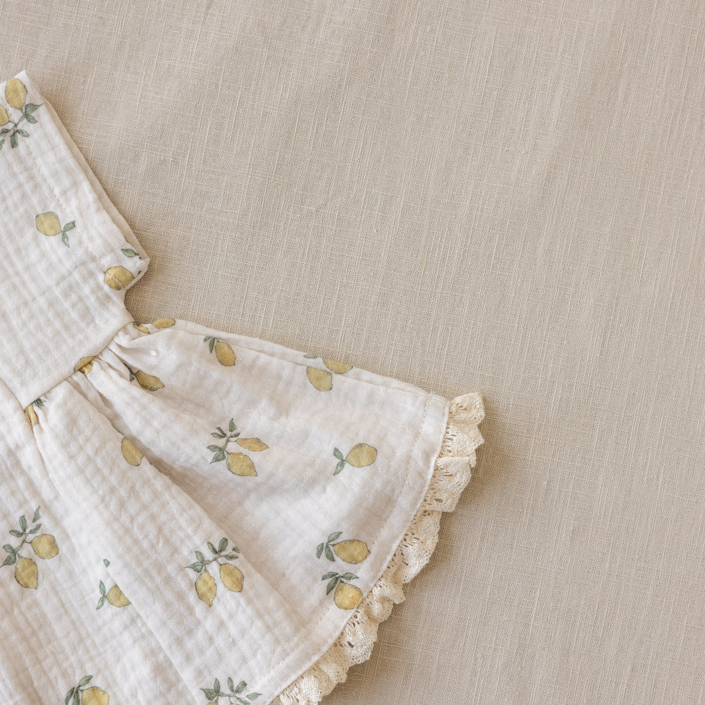 
                      
                        Malia baby dress / lemons + lace
                      
                    