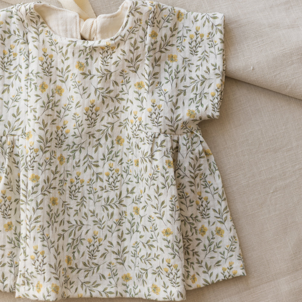 
                      
                        LIMITED EDITION * Malia baby dress / soft branches - yellow
                      
                    