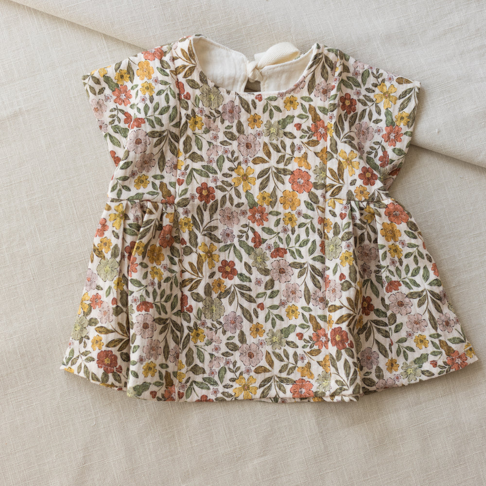 
                      
                        LIMITED EDITION * Malia baby dress / colorful flowers - caramel
                      
                    