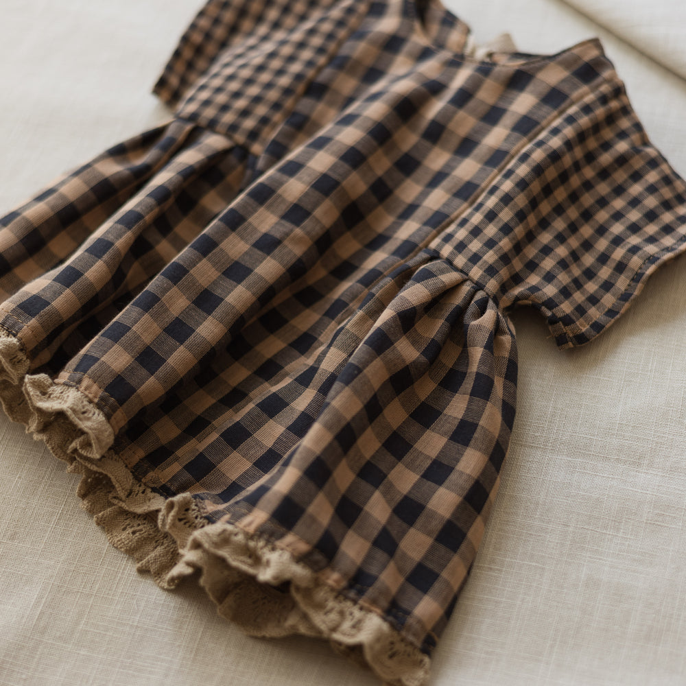 
                      
                        Malia baby dress / checkers - cacao
                      
                    