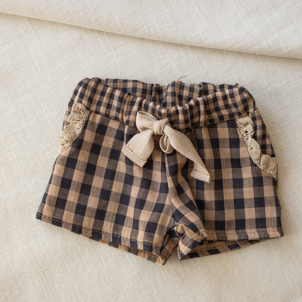 
                      
                        Muslin shorts / checkers - cacao
                      
                    