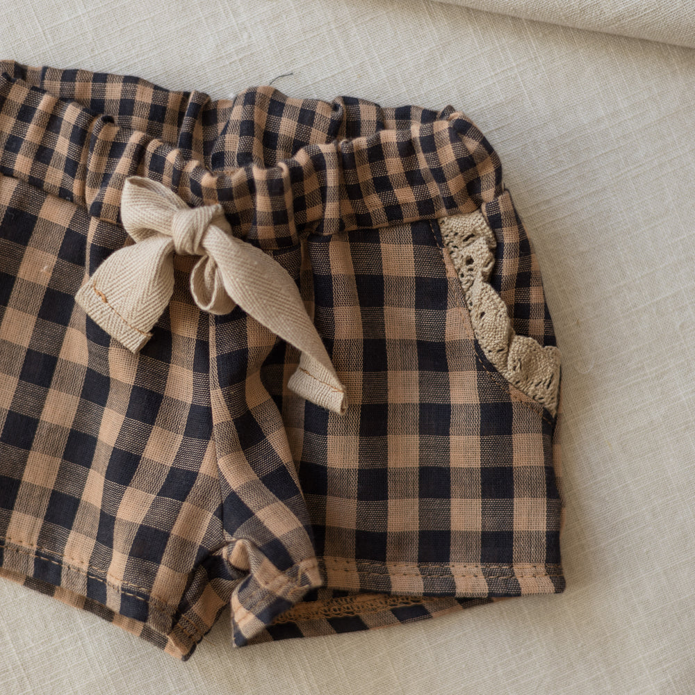 
                      
                        Muslin shorts / checkers - cacao
                      
                    