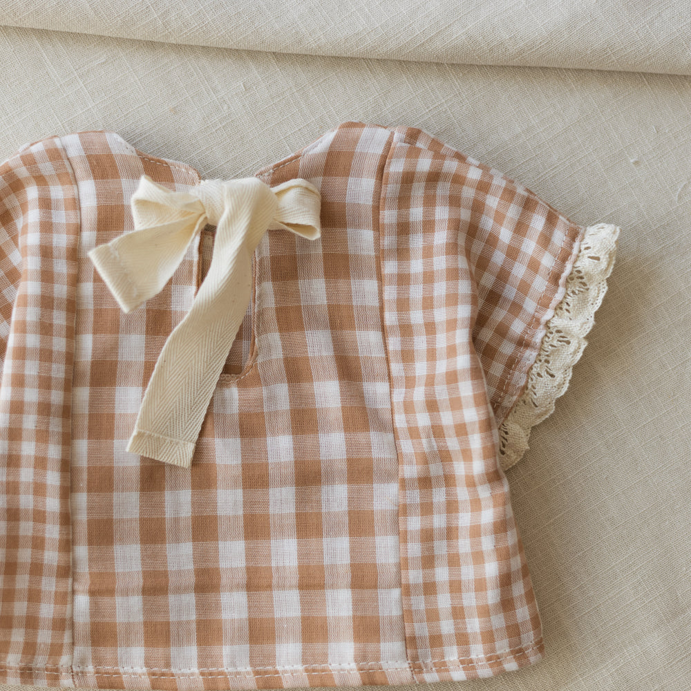 
                      
                        Muslin top / checkers - beige
                      
                    