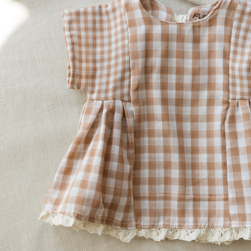 
                      
                        Malia baby dress / checkers - beige
                      
                    