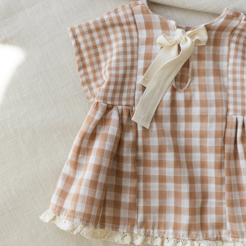 
                      
                        Malia baby dress / checkers - beige
                      
                    