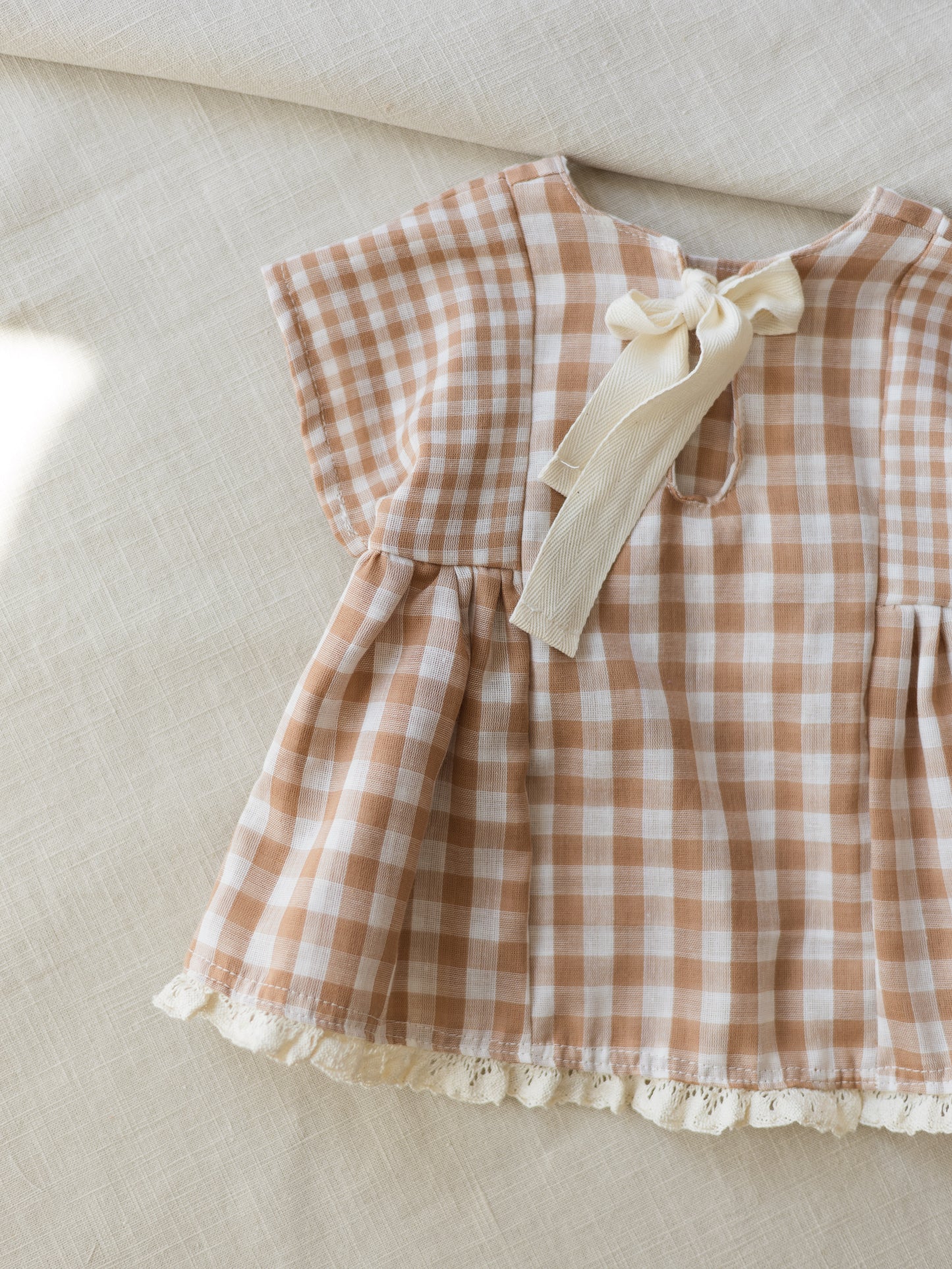 Malia baby dress / checkers - beige