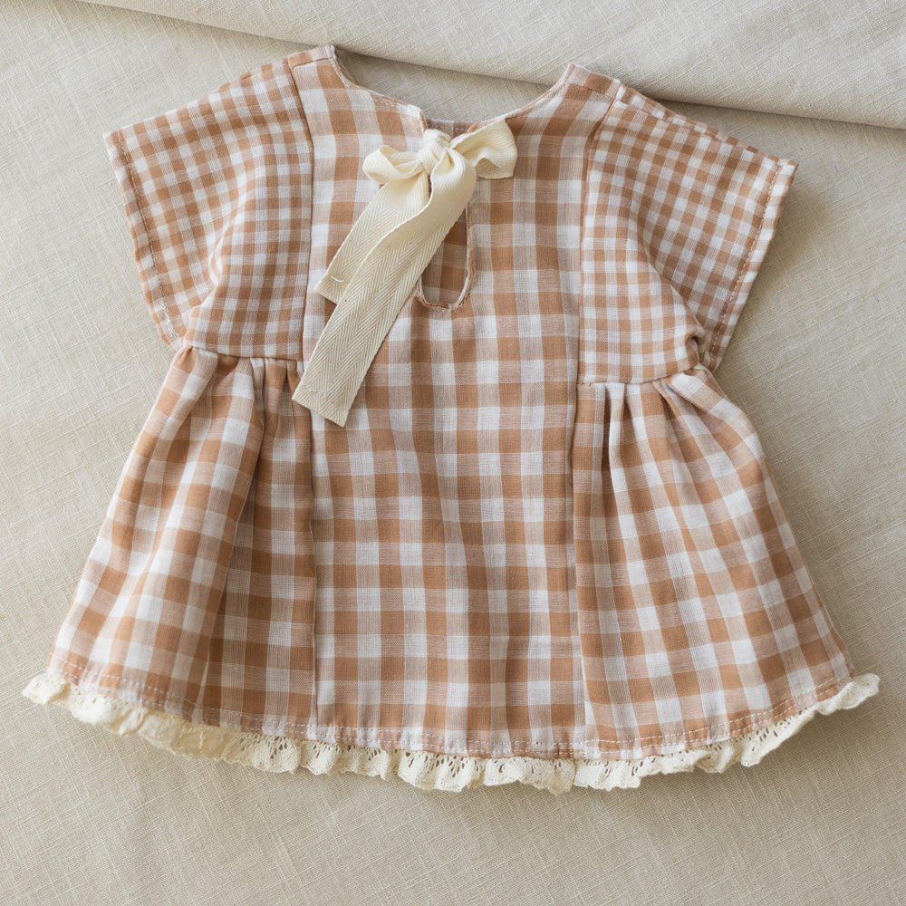 
                      
                        Malia baby dress / checkers - beige
                      
                    