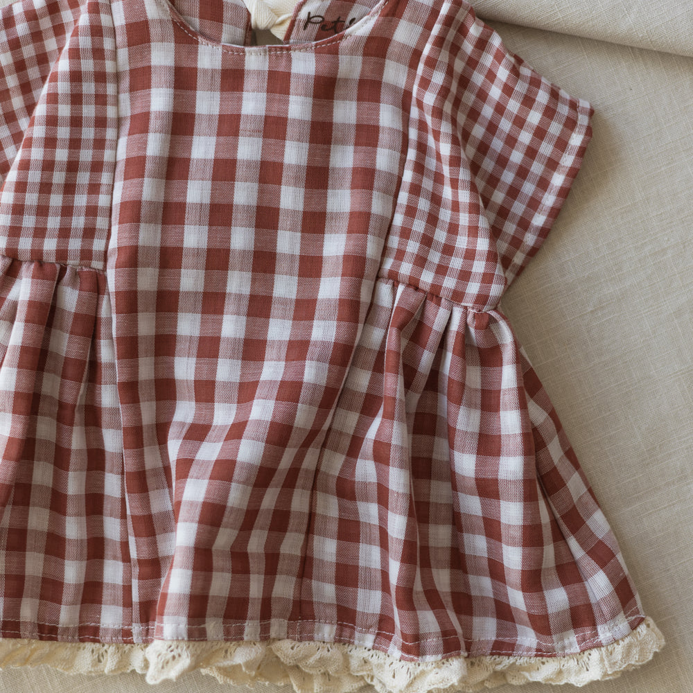 
                      
                        Malia baby dress / checkers - brick
                      
                    