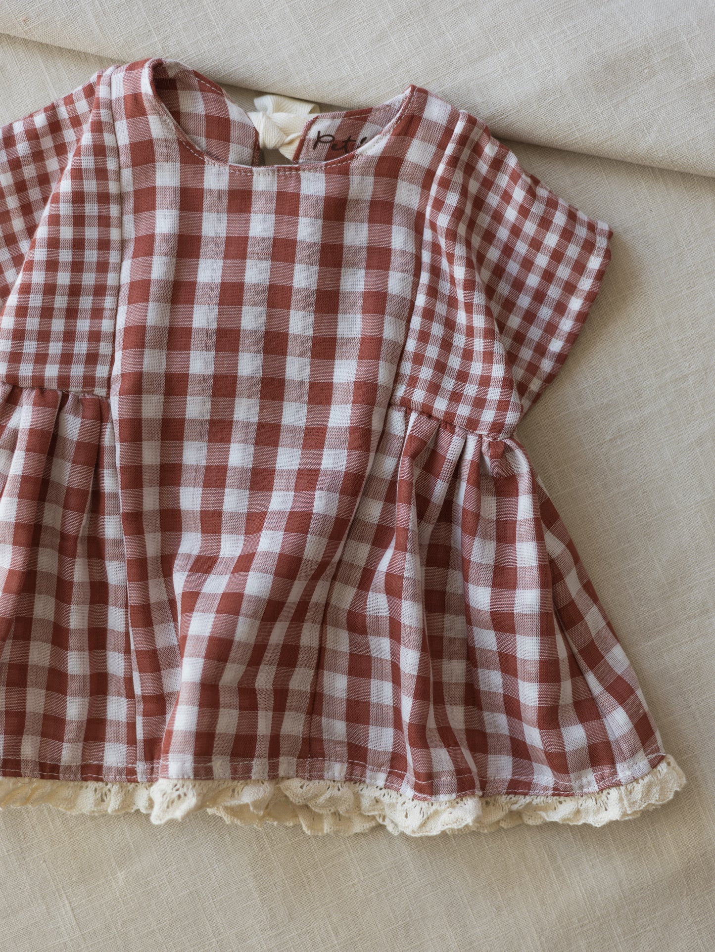 Malia baby dress / checkers - brick