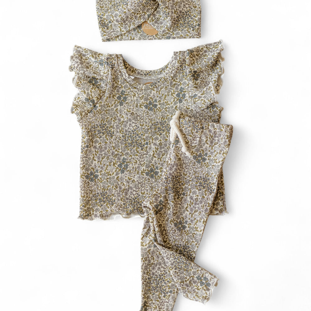 
                      
                        Ruffled t-shirt / Emerald Blossom
                      
                    