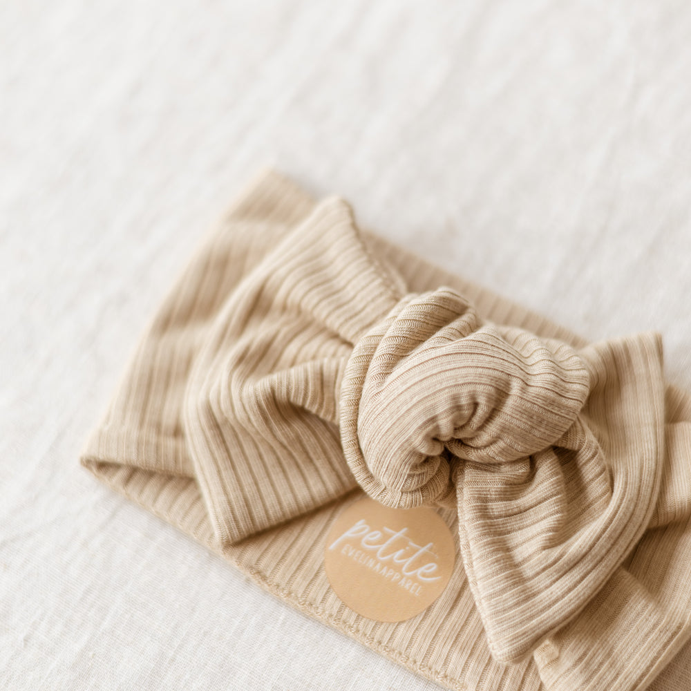 
                      
                        Bow Headband / Ribbed Modal - Beige
                      
                    
