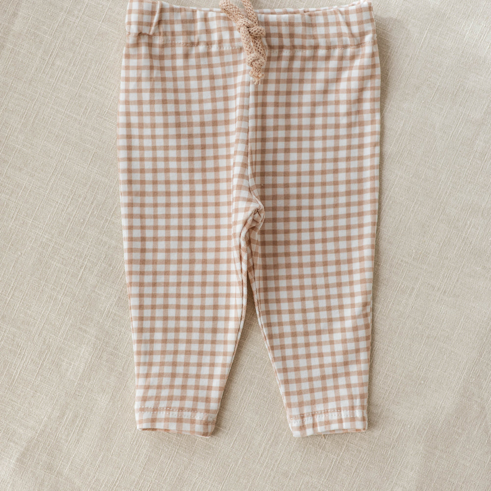 
                      
                        Baby leggings / tiny checkers - cookie
                      
                    