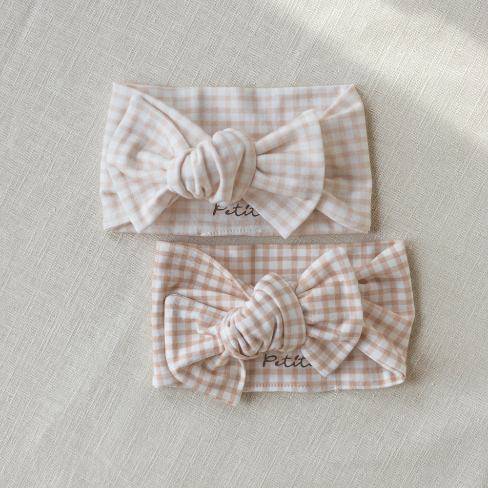 
                      
                        Bow headband / tiny checkers
                      
                    