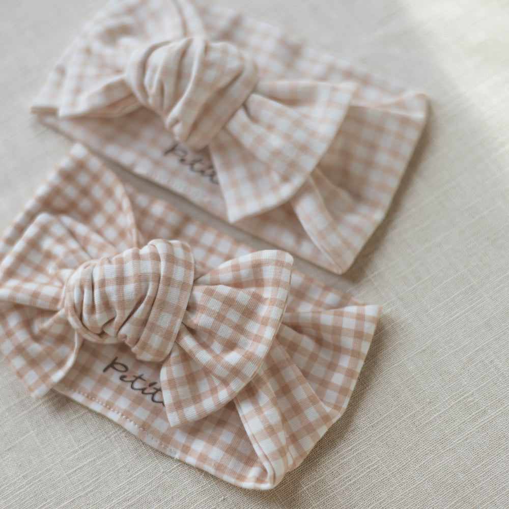 
                      
                        Bow headband / tiny checkers
                      
                    