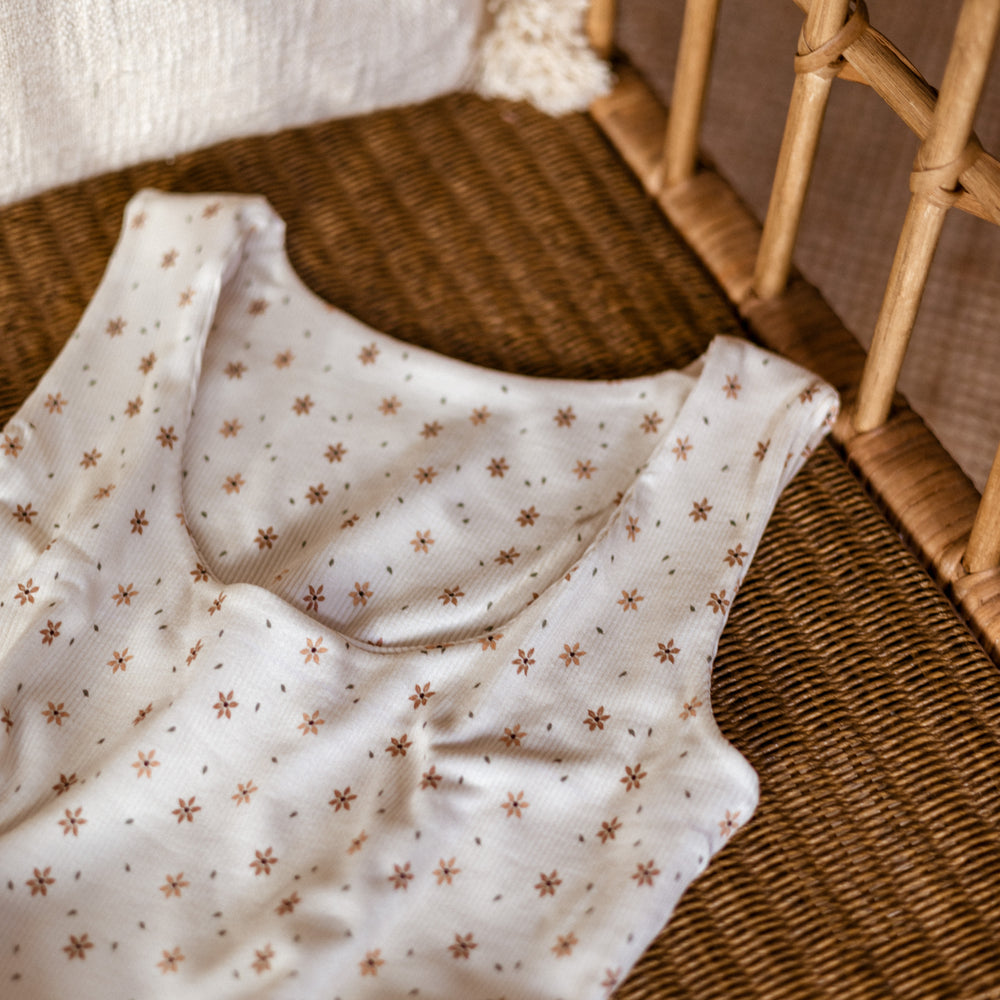 
                      
                        Sleeveless top tiny floral vanilla
                      
                    