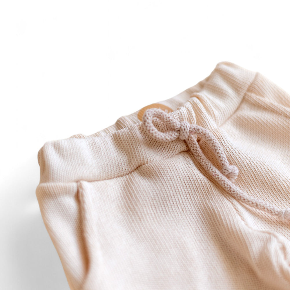 
                      
                        Knit sweatpants / Creamy Blush
                      
                    