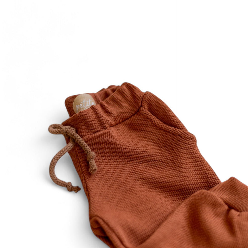 
                      
                        *Knit sweatpants / Rosewood
                      
                    