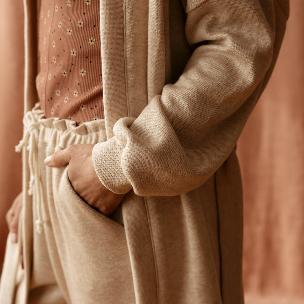 
                      
                        Long cardigan / cream knit
                      
                    
