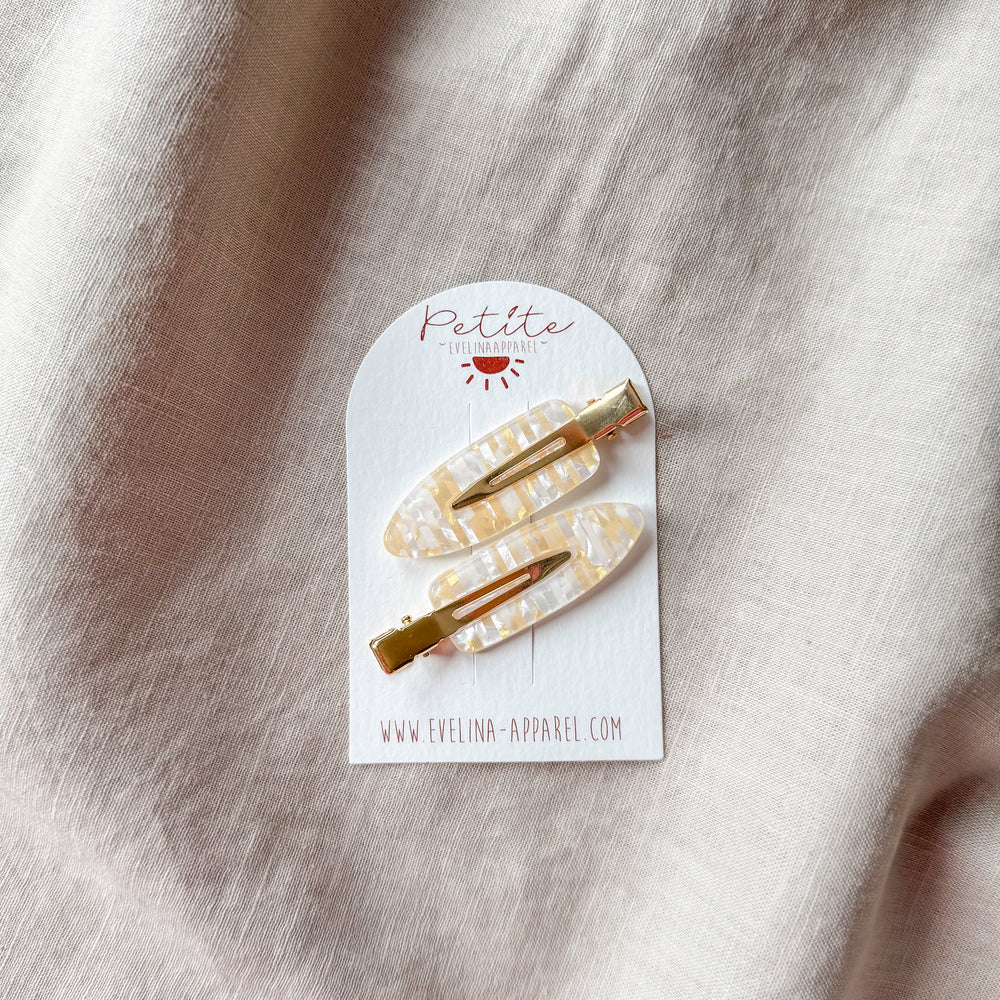 
                      
                        Hair clip set / butter
                      
                    