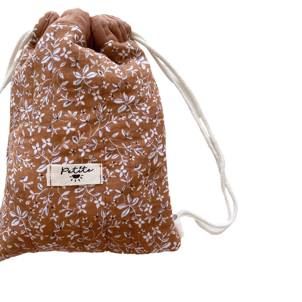 
                      
                        Cotton drawstring backpack / caramel flowers
                      
                    