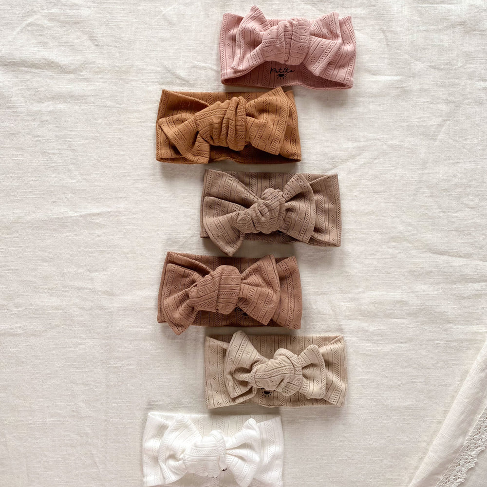 
                      
                        Bow headband / pointoille stripes
                      
                    