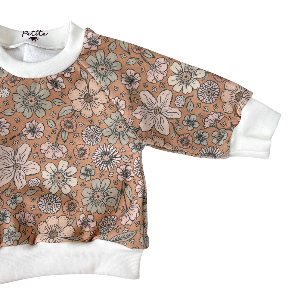 
                      
                        Baby cotton sweatshirt / bold floral - caramel
                      
                    