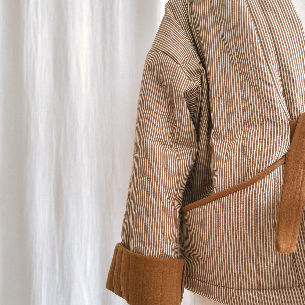 
                      
                        Quilted jacket / caramel stripes
                      
                    