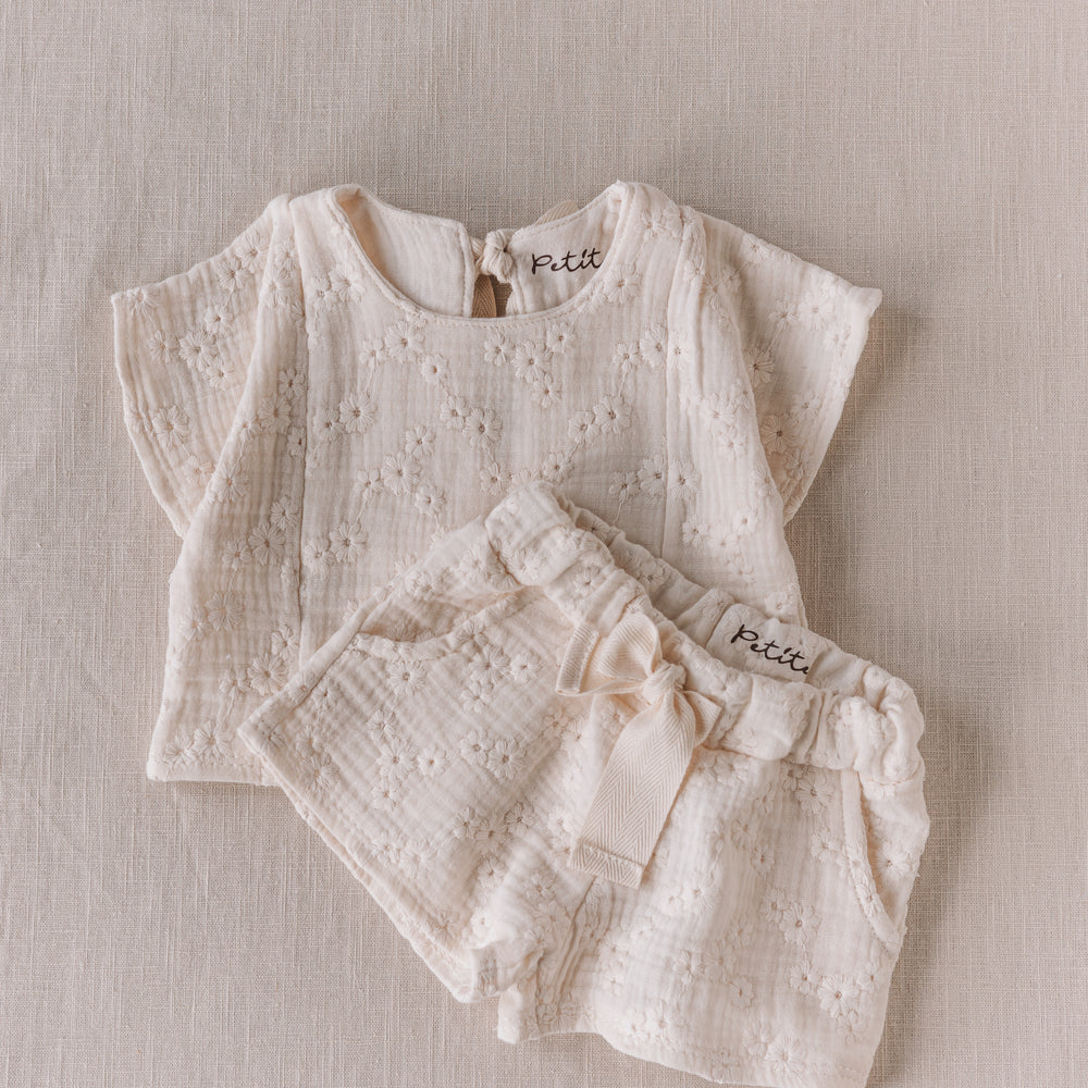 
                      
                        Embroidered muslin top
                      
                    