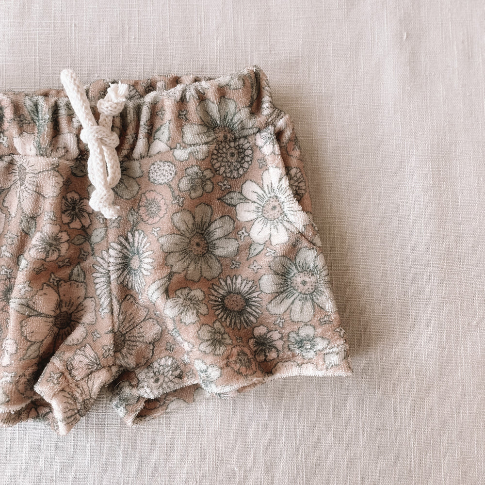 
                      
                        Terry shorts / bold floral caramel
                      
                    