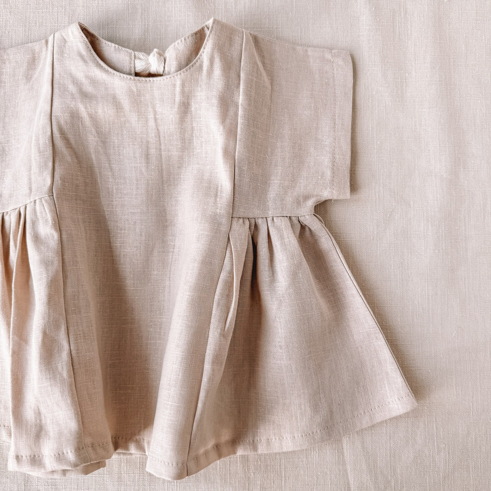 
                      
                        Malia baby dress / linen - light beige
                      
                    