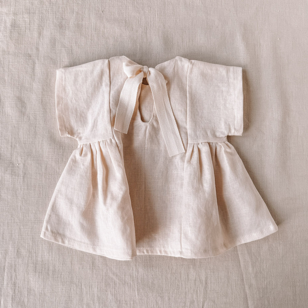 
                      
                        Malia baby dress / linen - milk
                      
                    