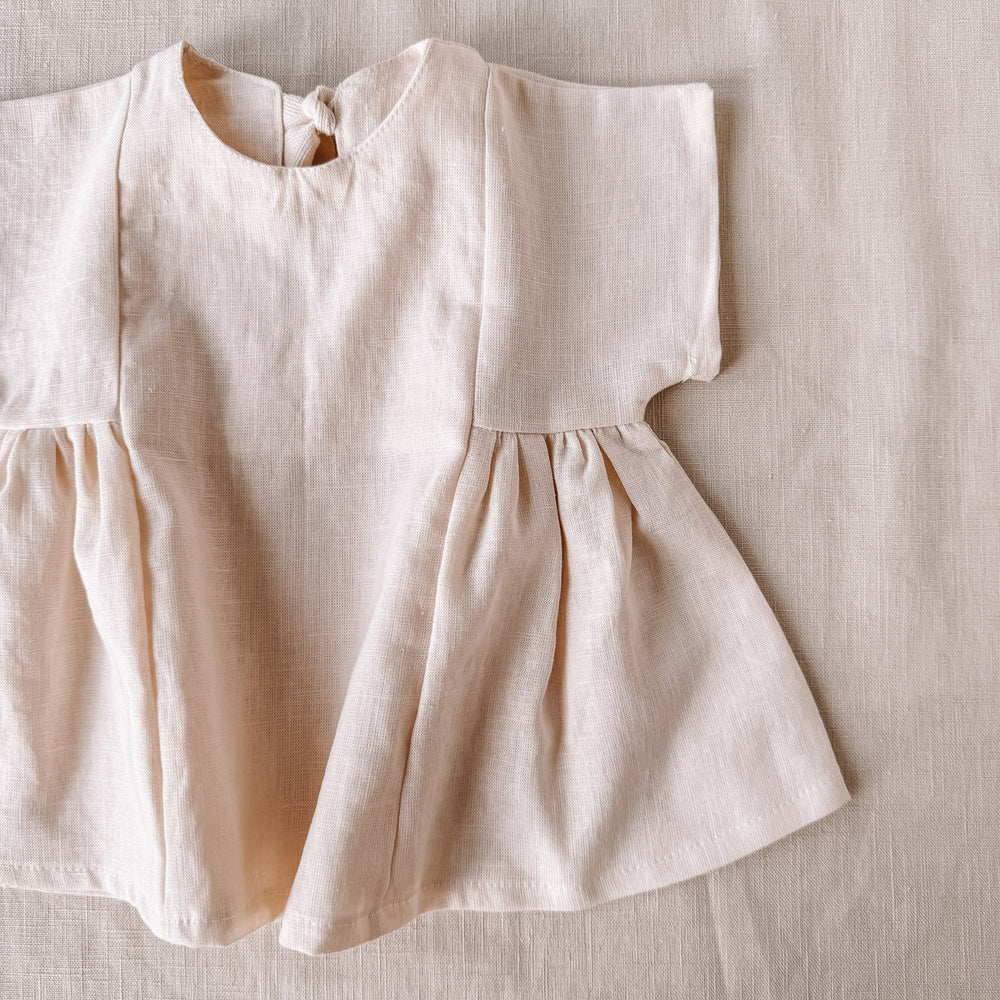 
                      
                        Malia baby dress / linen - milk
                      
                    