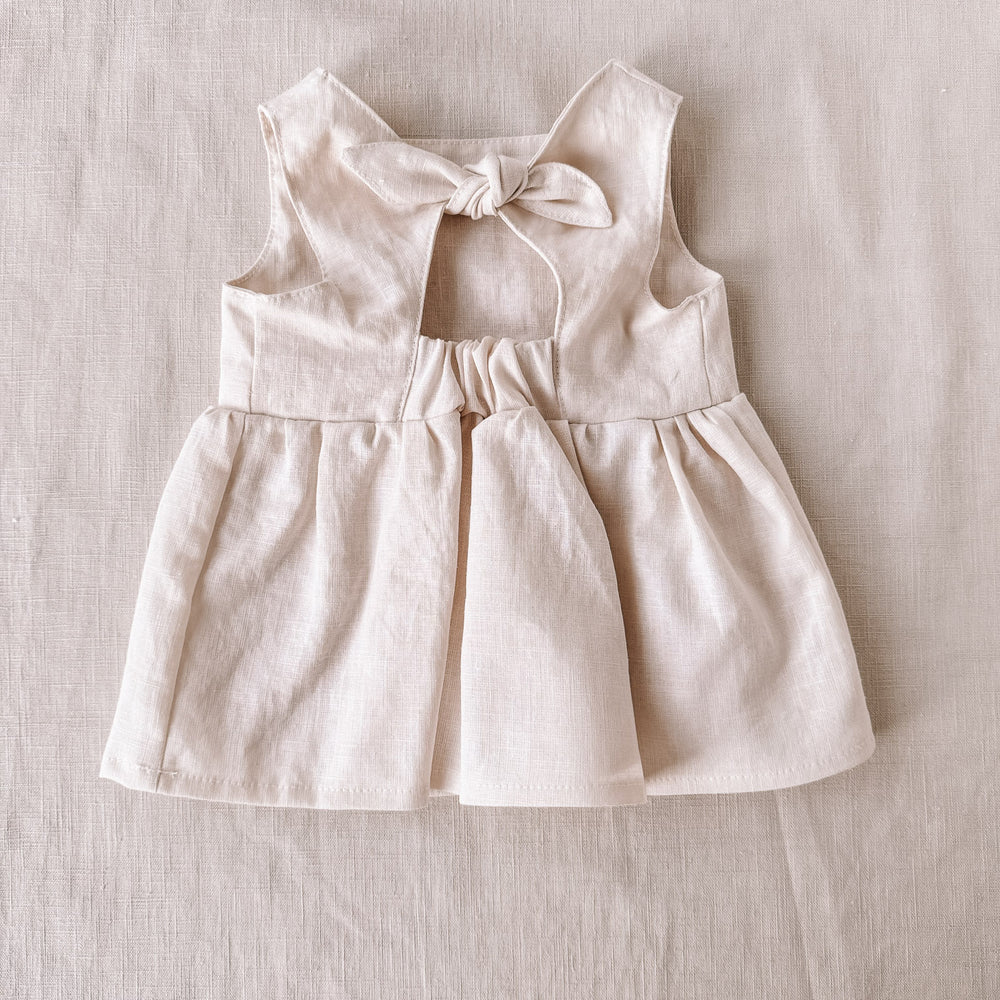 
                      
                        Arabella baby dress / linen - milk
                      
                    