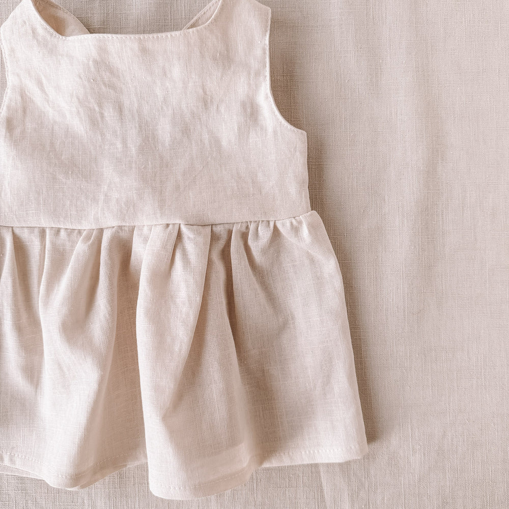 
                      
                        Arabella baby dress / linen - milk
                      
                    