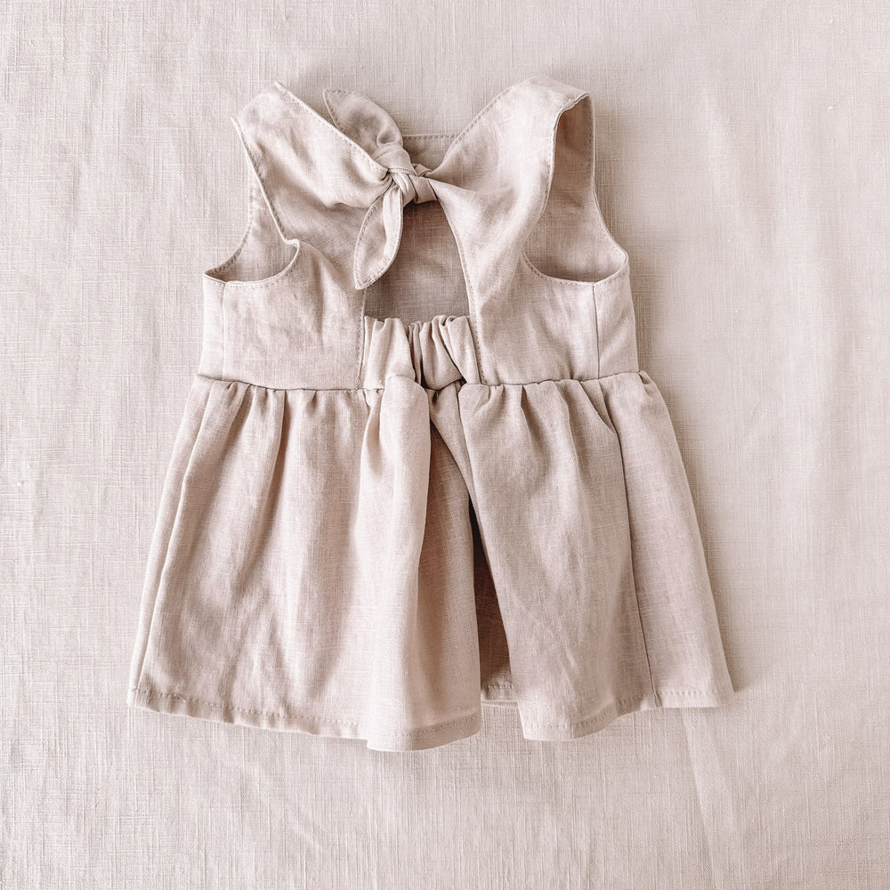 
                      
                        Arabella baby dress / linen - light beige
                      
                    