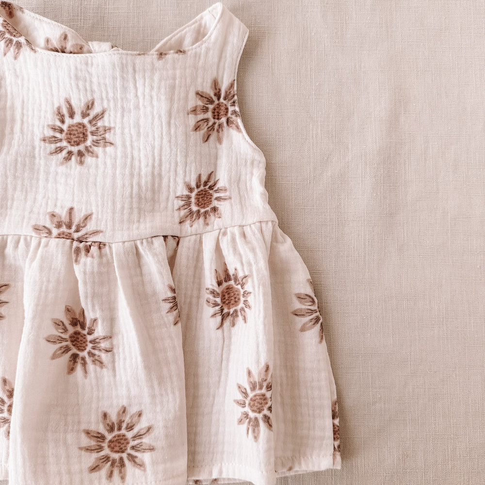 
                      
                        Arabella baby dress / sunflowers
                      
                    