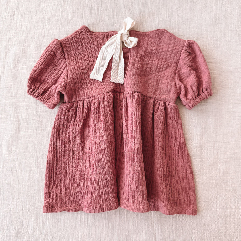 
                      
                        Florence baby dress / pink clay
                      
                    