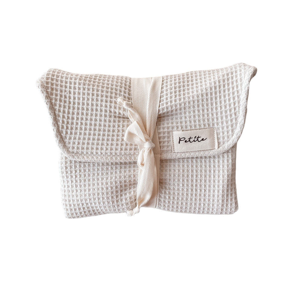 
                      
                        Diaper changing pad / oat
                      
                    