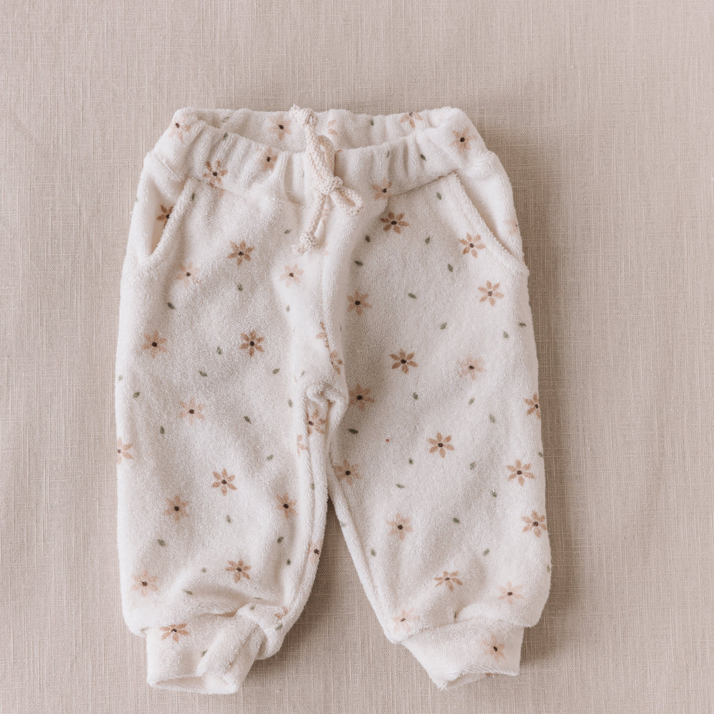 
                      
                        Toweling sweatpants / tiny floral
                      
                    