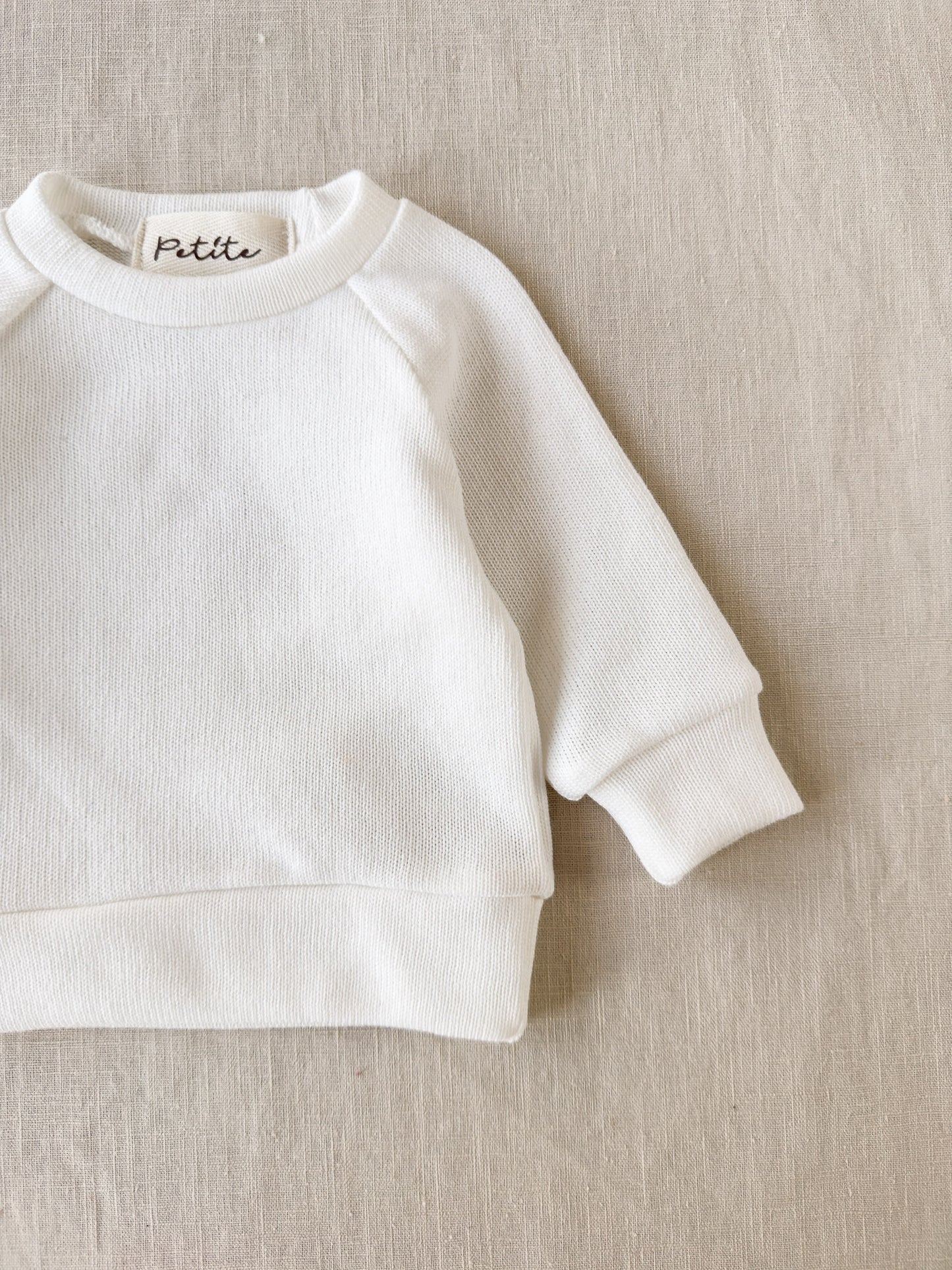 Knitted sweater / ivory