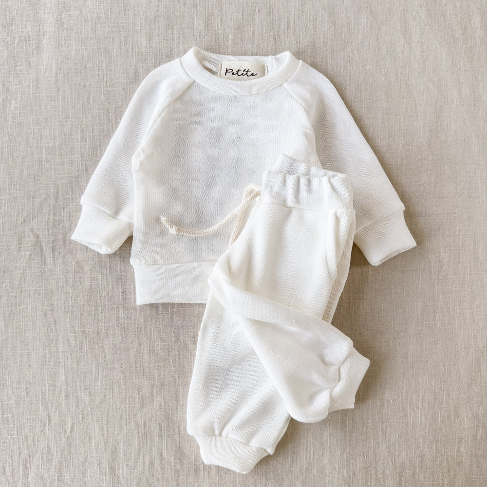 
                      
                        Knitted sweater / ivory
                      
                    