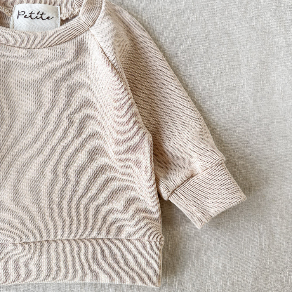 
                      
                        Knitted sweater / light beige
                      
                    