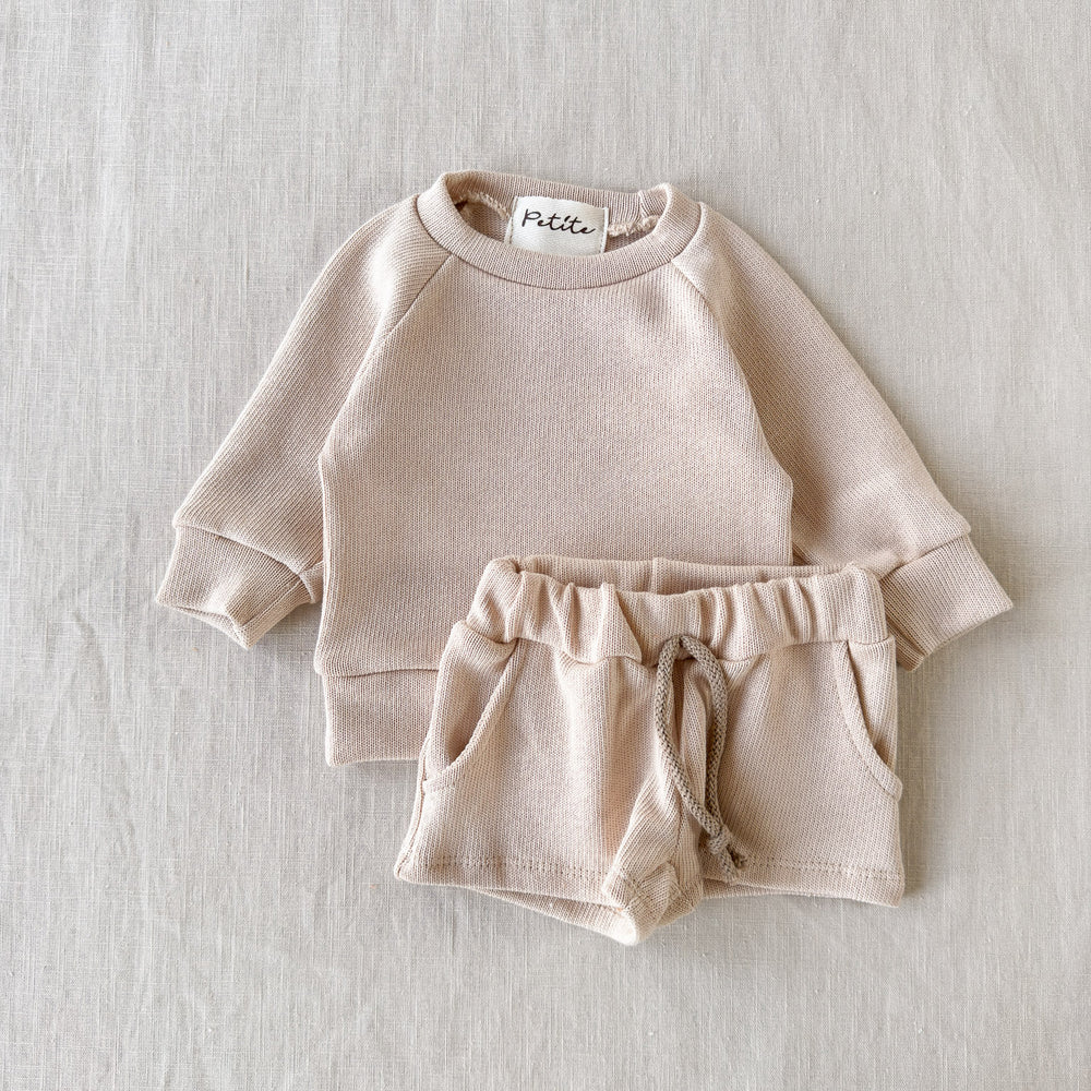 
                      
                        Knitted sweater / light beige
                      
                    