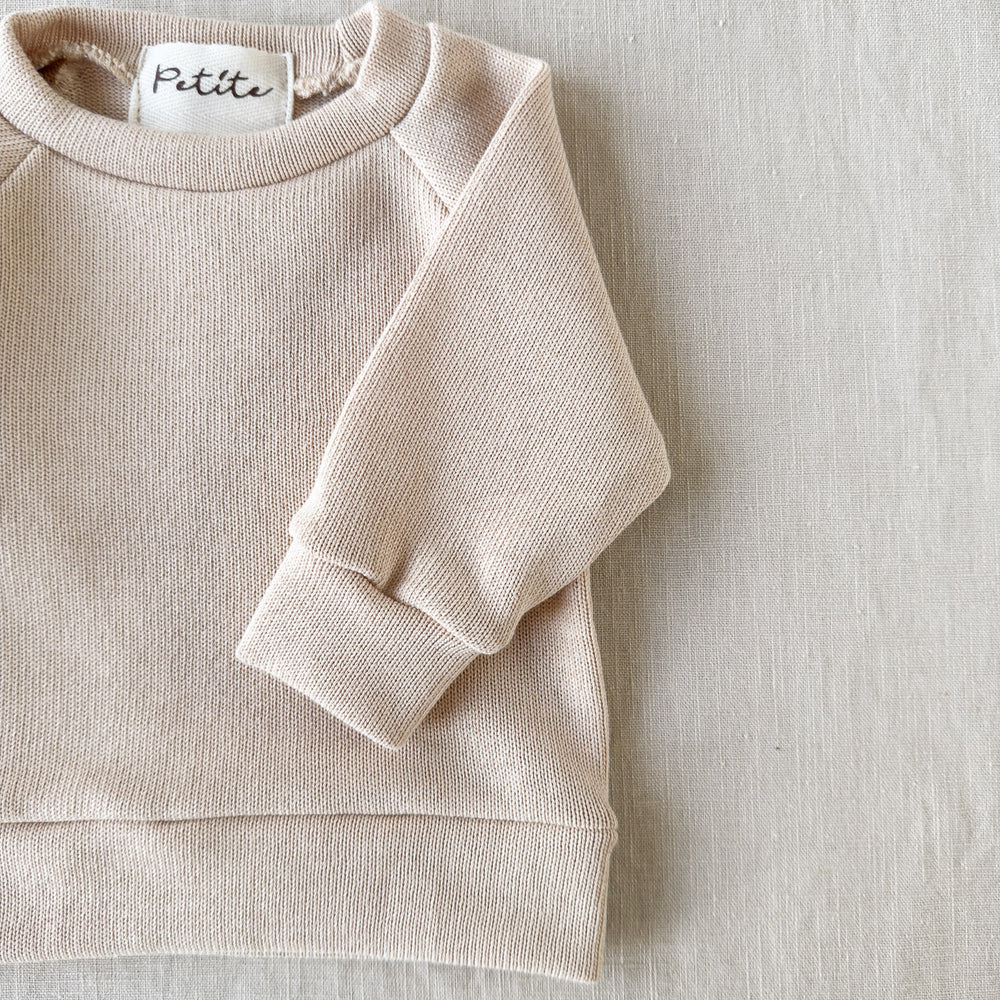 
                      
                        Knitted sweater / light beige
                      
                    