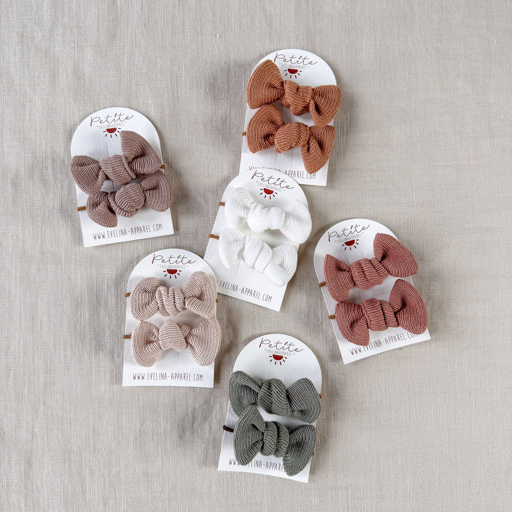 
                      
                        Pigtails bow set / clay
                      
                    